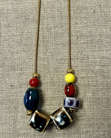 Collar cerámica cubo chocolate