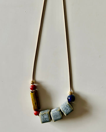 Collar cerámica cubitos grey