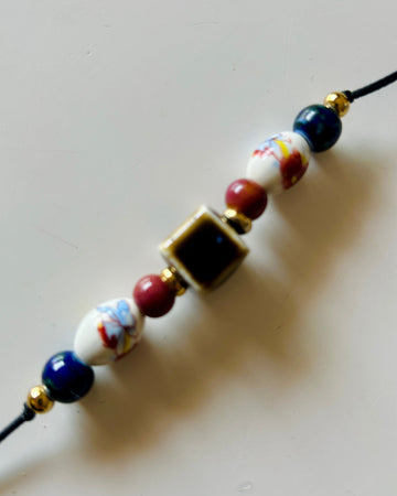 Pulsera cerámica cubo brown
