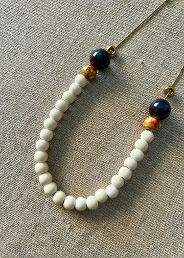 Collar bolitas cream